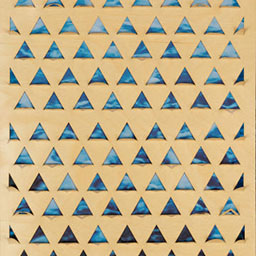 blue triangular pattern, laser cut onto wooden board.