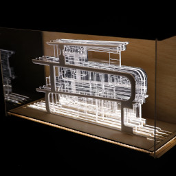 3D geometric acrylic model, curved features in a glass case with wooden back under LED lights.