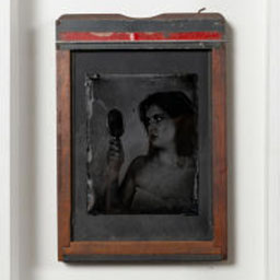 antique black and white portrait, female figure, orange frame.