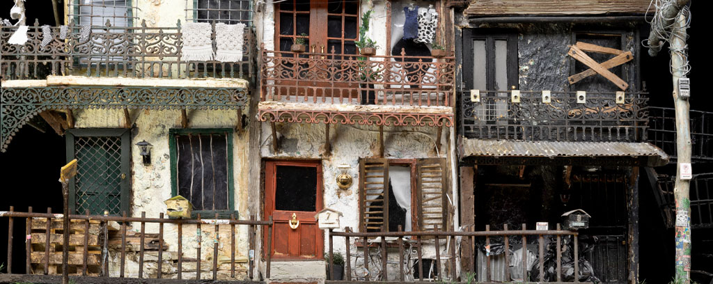 Intricate sculpture of three floating terrace houses