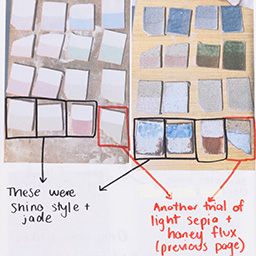 Close up of visual arts diary displaying progress images for a body of work