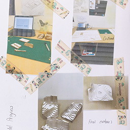Close up of visual arts diary displaying progress images for a body of work