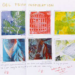 Close up of visual arts diary displaying progress images for a body of work