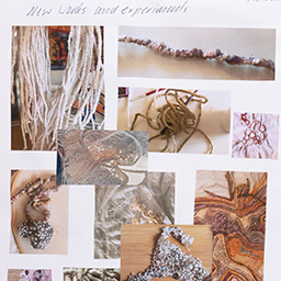 Close up of visual arts diary displaying progress images for a body of work